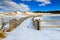 Frozen Pathway marked by wooden fence