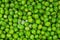 Frozen pea peases texture background. Green pease background pattern.