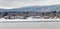 Frozen Pontoosuc Lake and  snow covered Berkshires