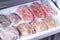 Frozen pork neck chops meat steakin the freezer