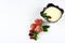 Frozen raspberry, blackberry, strawberries, yoghurt plate, mint leaves, on a white background top view, close up, set