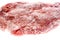 Frozen raw pork neck chops meat steak isolated on white.