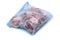 Frozen raw pork wrapped in plastic bag