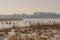 Frozen river, bent and icy anglers