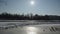 Frozen river neris in winter sunlight and floating floe in water