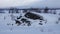 Frozen rock at lake Tornetrask in Abisko National Park in Sweden in winter