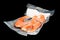 Frozen salmon in the vacuum packing