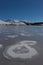 Frozen Servieres lake and Sancy massif in Auvergne