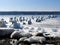 Frozen shapes glisten in the winter sun on Cayuga