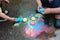 Frozen sidewalk paint preparation and use in a daycare/home school setting.