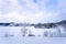 A frozen and snow covered lake `Jonsvatnet`, Norway. Wide angle landscape