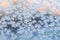 Frozen snowflakes on the window. Winter background