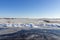 Frozen and snowy Dutch landscape with clear blue sky