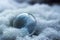 frozen soap bubble with ice flowers in the snow, macro still life with copy space