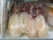 Frozen squids in vacuumed package for sale in supermarket