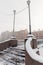 Frozen stairs and lanterns of the Kolomensky Bridge