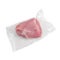 Frozen turkey fillet. In plastic vacuum packaging. White background. Isolated. View from above