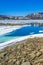 Frozen turquoise lake Vavatn panorama in summer landscape Hemsedal Norway