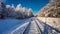 Frozen unused railway line in winter at sunrise, Poland