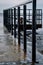 Frozen watching platform on the Mangalsala or Eastern pier in Riga, Latvia where the river Daugava flows into the Baltic Sea