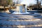 Frozen water fountain in Granbury, Texas during winter freeze