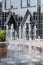 Frozen water of fountain by modern futuristic architecture in downtown Pittsburgh