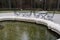 Frozen water in the fountain in winter