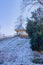 Frozen water of a pond with pieces of ice, hoarfrost