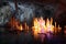 Frozen water Stalagmite in deep marble cave, Russia