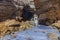 Frozen waterfall in a gorge high in the mountains