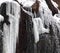 Frozen waterfall with icicles and snow near Bad Harzburg in the fir forests and spruce forests along the main road to Braunlage in