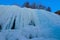 Frozen waterfall on the way of Chadar trek