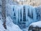 Frozen Waterfall in a Winter Forest. AI generated