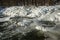 Frozen weir in winter