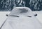 Frozen winter car covered snow, view front window windshield