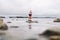 Frozen winter sea with decorative lighthouse. Nautical lifestyle. Winter, Sea, Travel, adventure, holidays and vacation