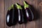 Frsh organic eggplant on the wooden boards