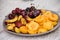 Fruit apricots, nectarines, cherries on a large plate