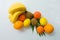Fruit. Bananas, tangerines, kiwi, orange and lemons on a white background. Flat lay.