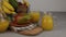 Fruit basket and glass of juice. Fresh Mango juice, orange juice. Fruit basket on the table. Fresh fruits and juic