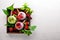 Fruit berry yoghurts and stripes. On a wooden background