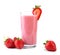 Fruit beverage with strawberries and milk. A glass full of fresh and bright red strawberries and organic milk. Pink smoothie .