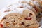 Fruit bread sliced macro on a white plate. horizontal