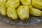 The Fruit Bulbs or Pods or edible pulps of jackfruit is placed in a plate. The scientific name of jackfruit is Artocarpus