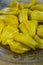 The Fruit Bulbs or Pods or edible pulps of jackfruit is placed in a plate. The scientific name of jackfruit is Artocarpus