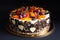 Fruit cake with chocolate border on black background