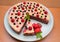 fruit cake with pudding and variety of berries, raspberries, black currant and strawberries