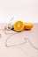 Fruit composition with wire, orange, cup