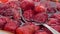 Fruit compote from a strawberry. Approaching, zooming. 4K