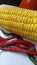 a fruit of corn, chilli, background